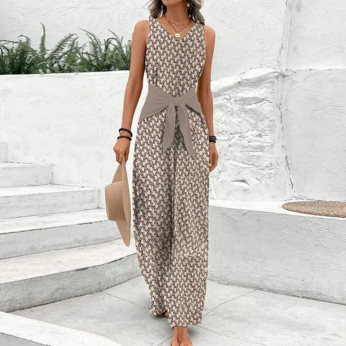 Dames Jumpsuit Mouwloos met V-hals en Strikceintuur Grafische Print Beige