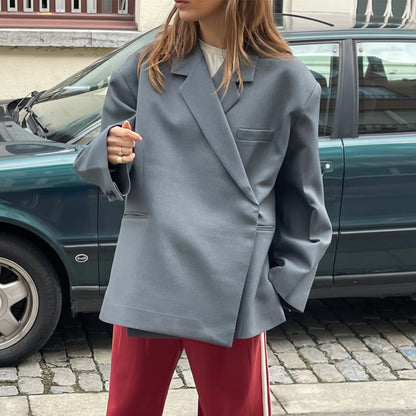 Dames Zwarte Oversized Blazer met Trendy Pasvorm en Verfijnde Afwerking 1