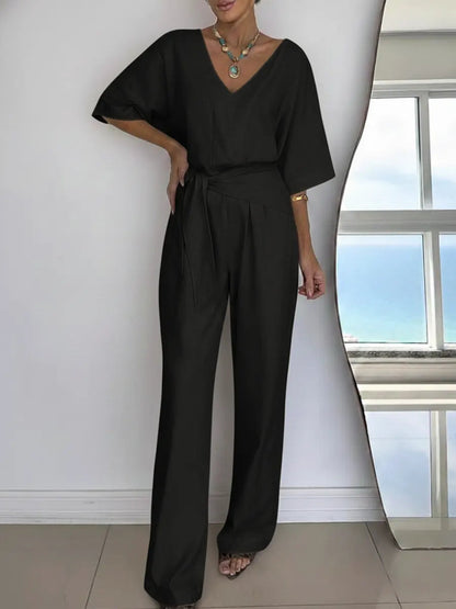 Dames Jumpsuit met V-hals, Vleermuismouwen en Strikceintuur Zwart