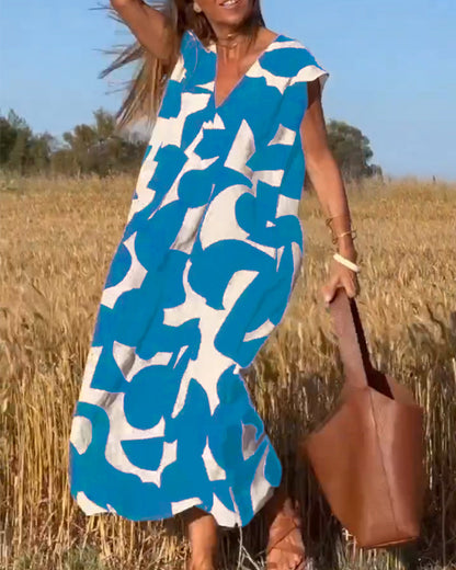 Dames Maxi Jurk met V-hals en Abstract Print Korte Mouw Blauw