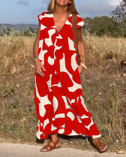 Dames Maxi Jurk met V-hals en Abstract Print Korte Mouw
