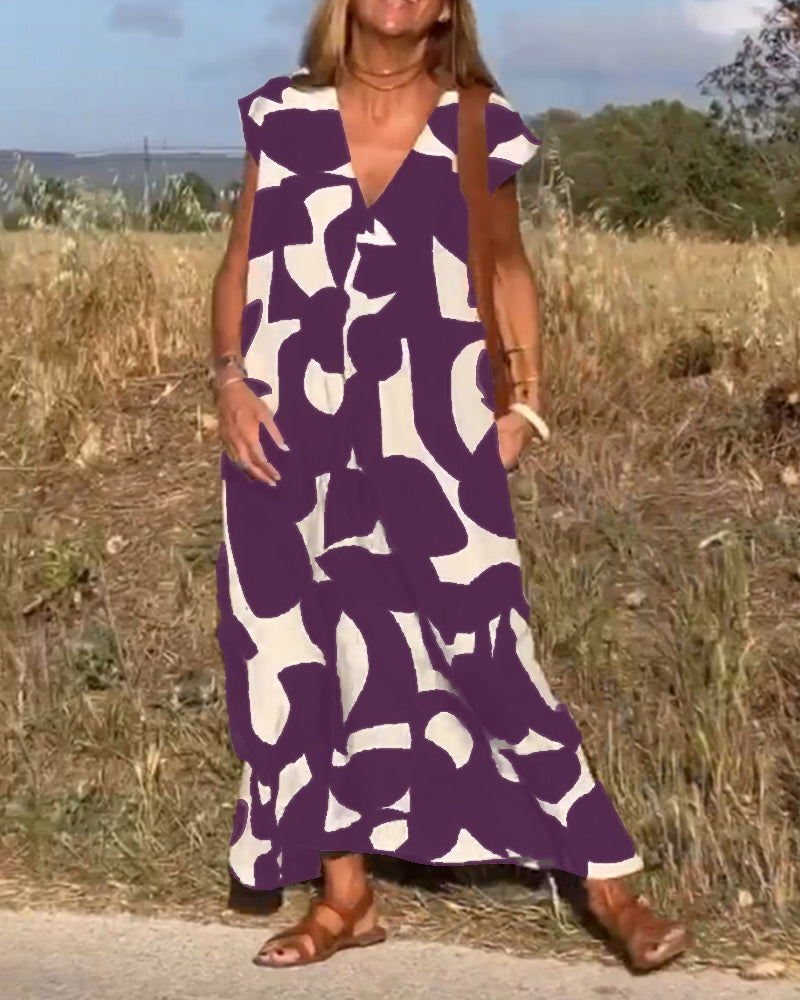 Dames Maxi Jurk met V-hals en Abstract Print Korte Mouw