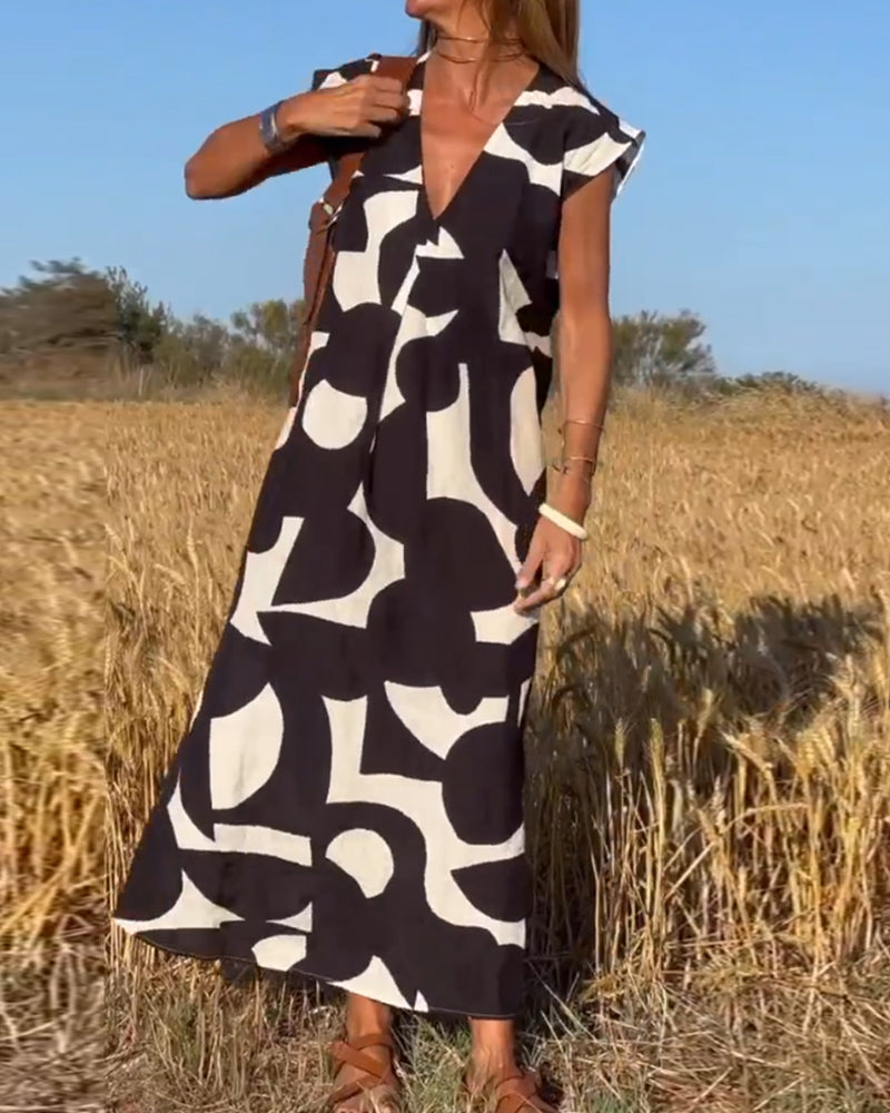 Dames Maxi Jurk met V-hals en Abstract Print Korte Mouw