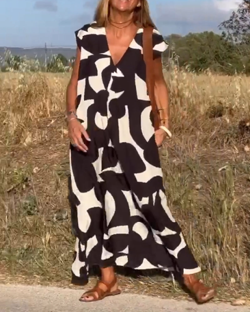 Dames Maxi Jurk met V-hals en Abstract Print Korte Mouw