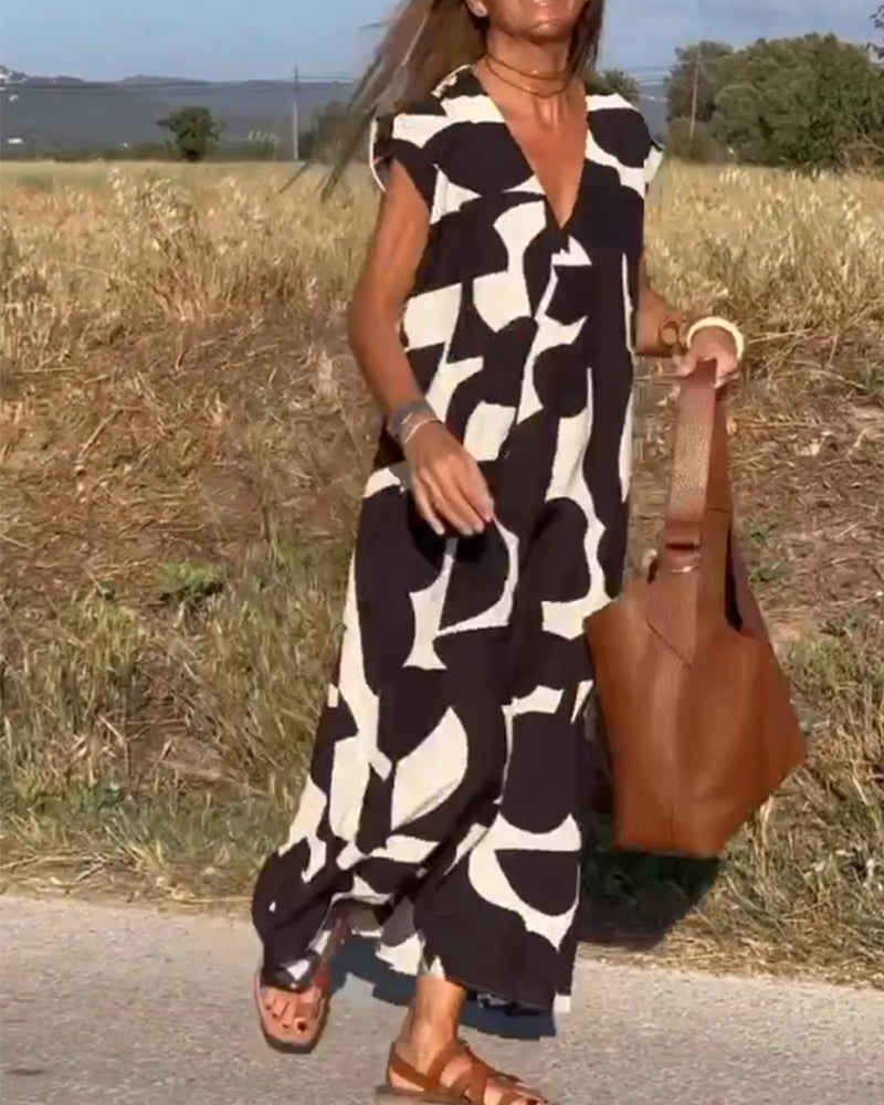 Dames Maxi Jurk met V-hals en Abstract Print Korte Mouw