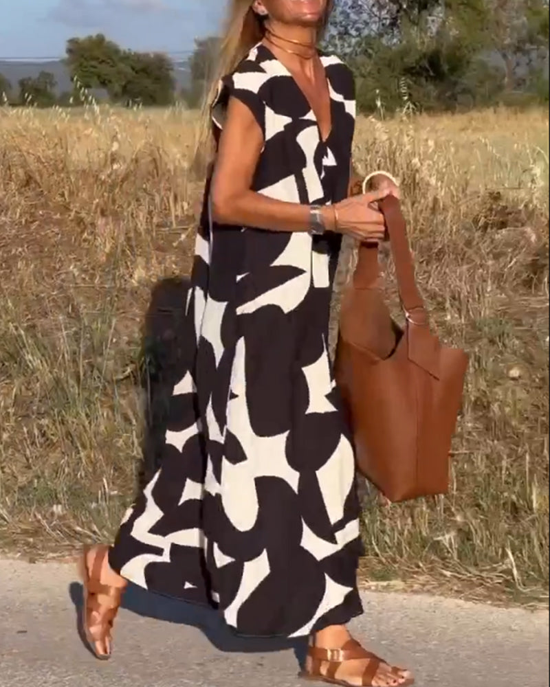 Dames Maxi Jurk met V-hals en Abstract Print Korte Mouw