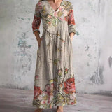 Dames Maxi Jurk met V-hals en Driekwart Mouw Bloemenprint