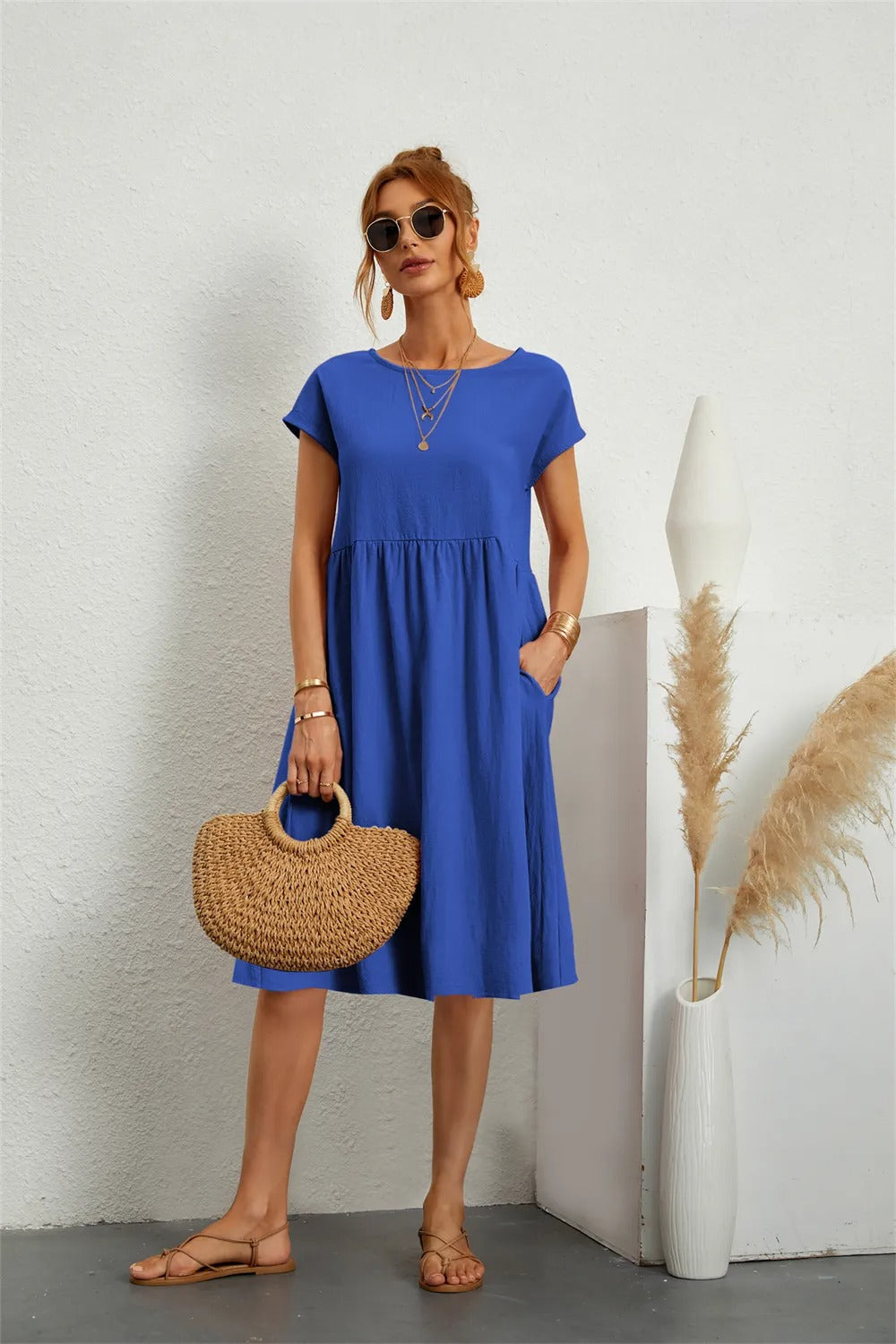Dames Midi Jurk Korte Mouw met Ronde Hals en Zakken Blauw