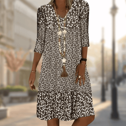 Dames Midi Jurk met V-hals en Bloemenprint Driekwart Mouw