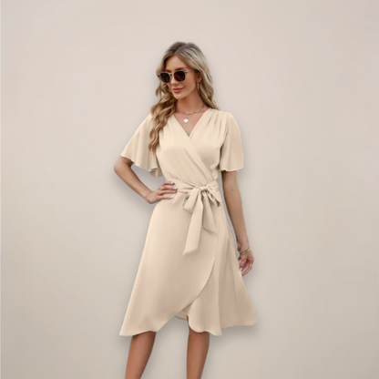 Dames Midi Wikkeljurk met V-hals, Vlindermouwen en Strikceintuur Beige