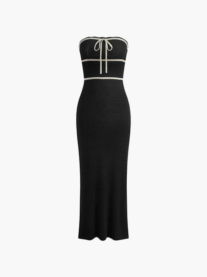 Dames Mouwloze Midi Jurk met Strapless Halslijn en Contrastbies Zwart Wit