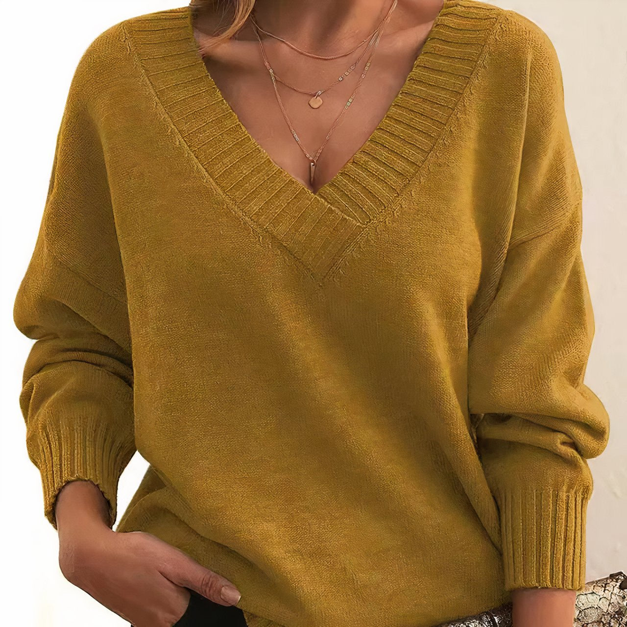 Dames Sweater met V-hals en Lange Mouwen en Geribbelde Boorden Goud