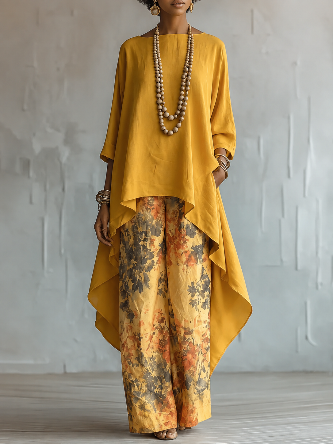 Dames Toesuit met Asymmetrische Oversized Top en Bloemenprint Broek Geel